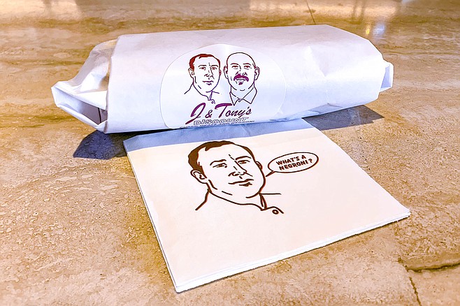 A sandwich wrapped up with J & Tony caricatures