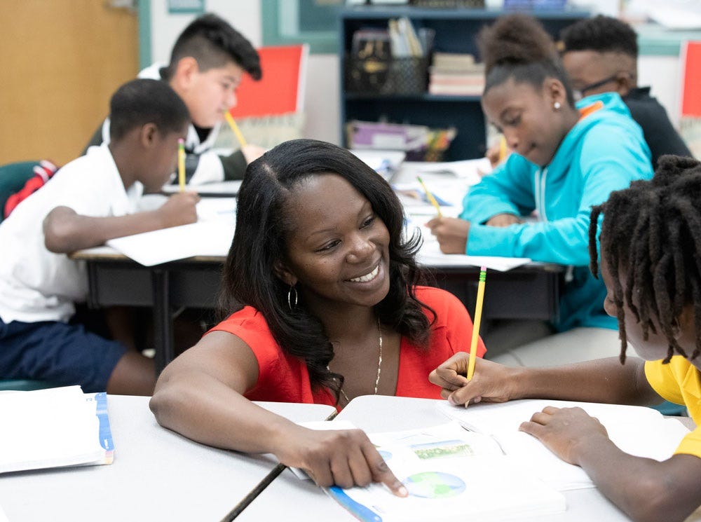 IRSC graduate Nikki Hart thrives as a fifth-grade science teacher at Chester A. Moore Elementary in Fort Pierce. The district recently took over the school's turnaround plan after the school failed to get a C grade.