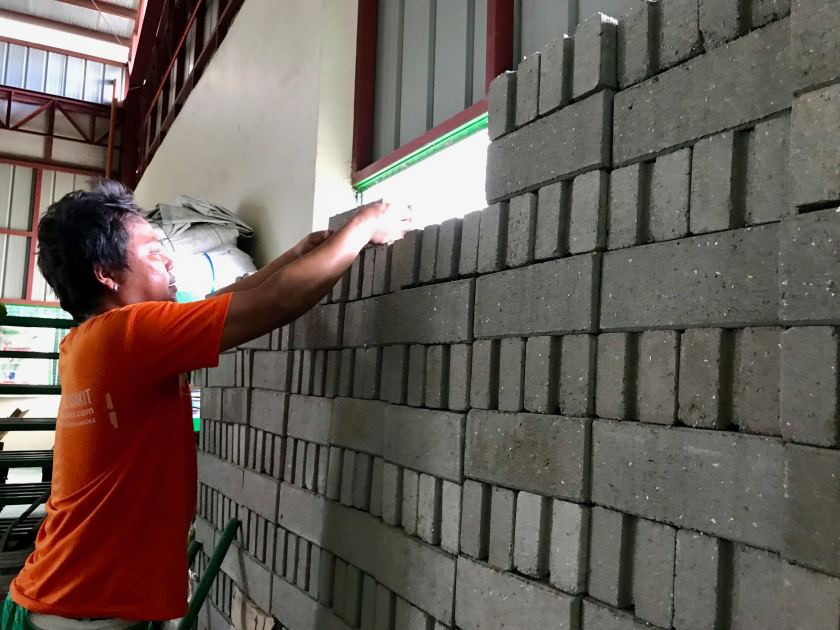Bricks made partially from used plastic sachets are positioned at the Philippine Alliance for Recycling and Materials Sustainability recycling facility in Parañaque, a suburb of Manila.