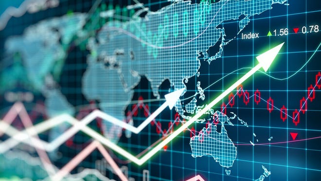 Digital world map with stock market charts indicating gains.