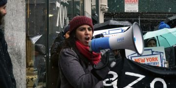 Not Santa’s Workshop: Amazon’s Warehouse Workers Endure Holiday Season Speedup