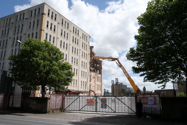 A picture of work taking place to demolish the Imperial Tobacco building in Triumph Road.
