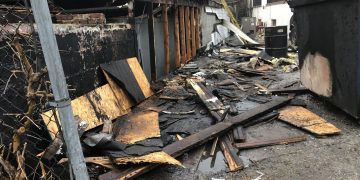 2nd person charged in connection with fire at Cargo Cafe