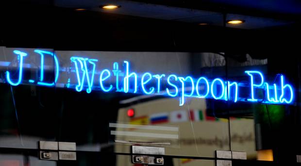 File photo dated 15/07/2015 of a JD Wetherspoon pub, as the chain is to invest more than ??200 million in pubs and hotels over the next four years, creating around 10,000 jobs, the company has announced.