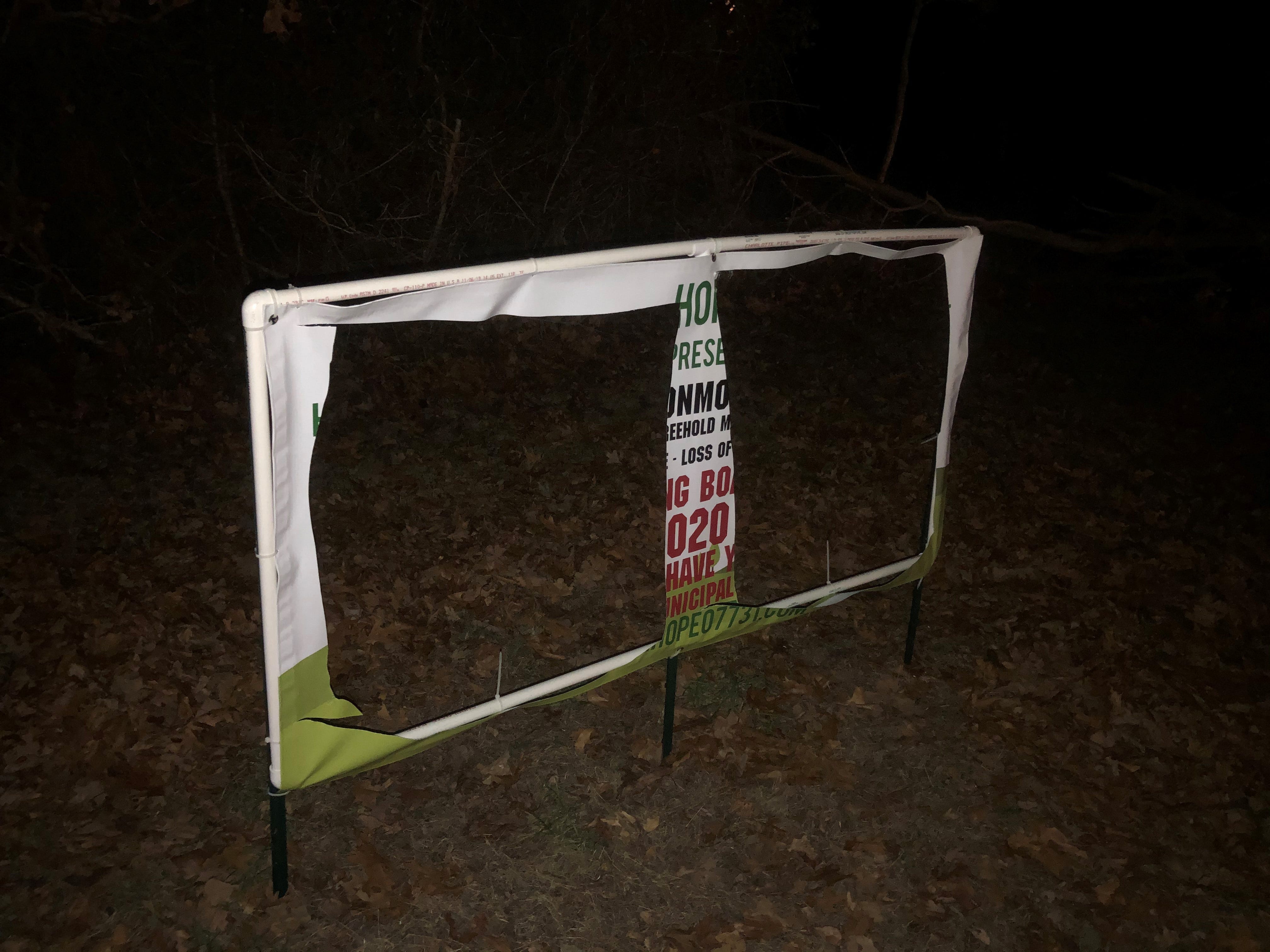 Opponents of the proposed Monmouth Commerce Center say their sign was vandalized in early January.
