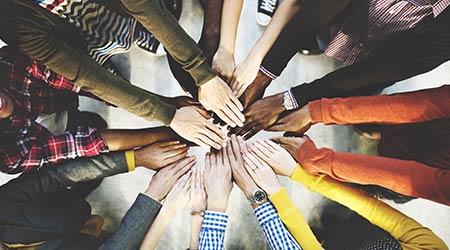 Group of Diverse Hands Together Joining Concept