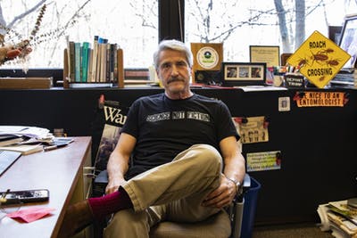 Clinical associate professor Marc Lame sits at his desk Jan. 22 in the School of Public and Environmental Affairs. Lame is a 20-year faculty member and holds degrees in agriculture, entomology, and public administration.