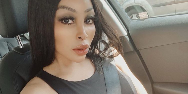 Khanyi Mbau showcases Anti-Fake cargo suit while introducing her new dog, Money