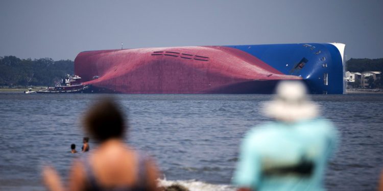 Before Slicing Up Overturned Cargo Ship, An Environmental Barrier Will Be Installed