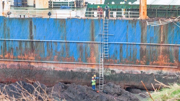 Personnel from Cork County Council board the wreck of the ghost ship MV Alta which was driven aground during Storm Dennis near Ballycotton, Co Cork. Picture; David Creedon/Anzenberger.