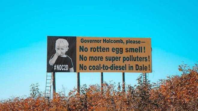 A billboard had been added along Interstate 64 in Spencer County in Indiana in opposition to a proposed plant that would turn coal into diesel fuel.