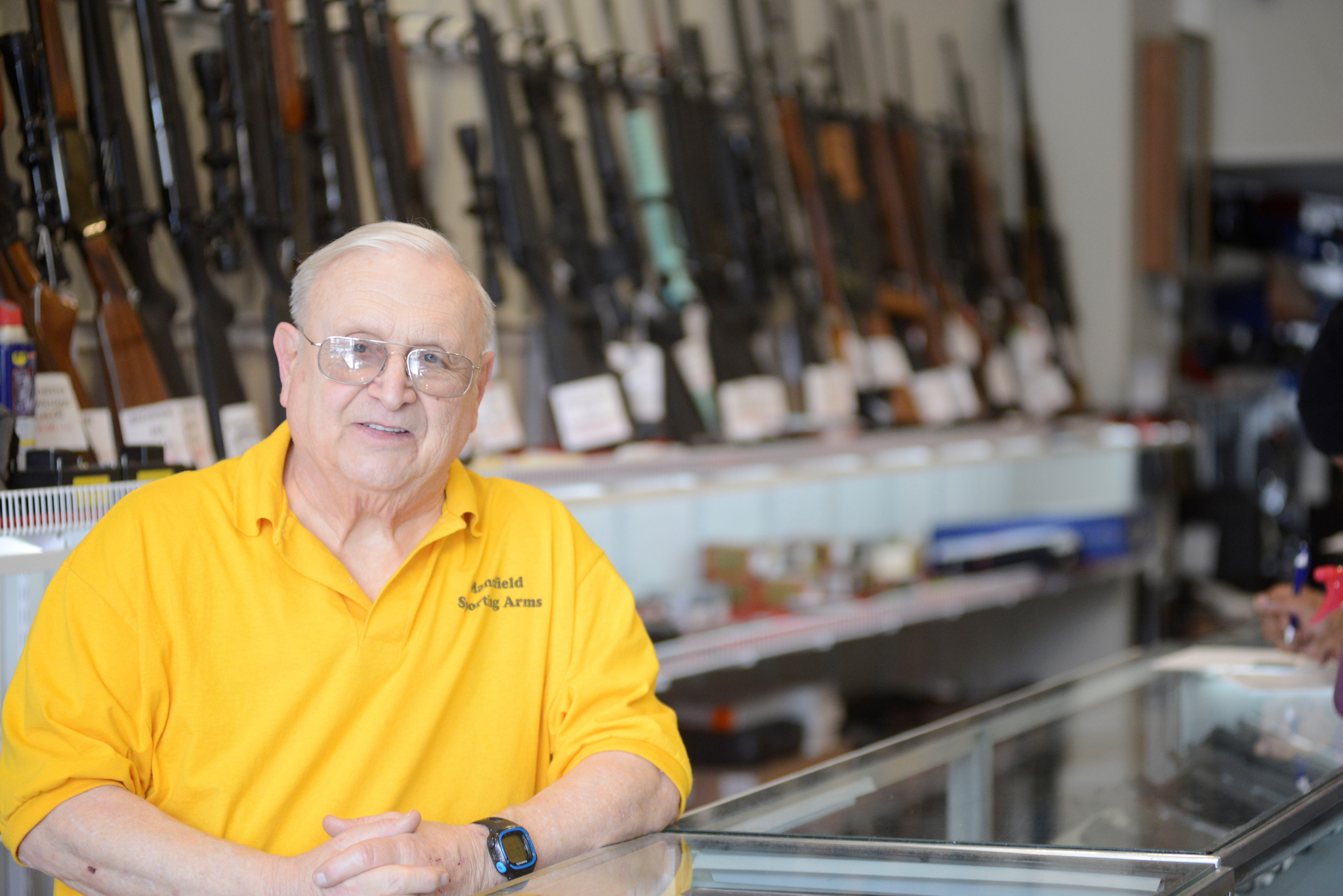 Wally Toward of Mansfield Sporting Arms has seen an uptick in sales ever since moving to a new location on the square three weeks ago.