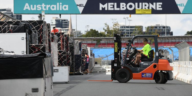 How does an F1 team get two cars and 42 tonnes of freight to Australia?