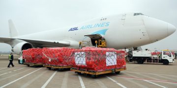 Cargo aircraft carrying 500,000 surgical masks arrives from China at Liege Airport before continuing to Rome