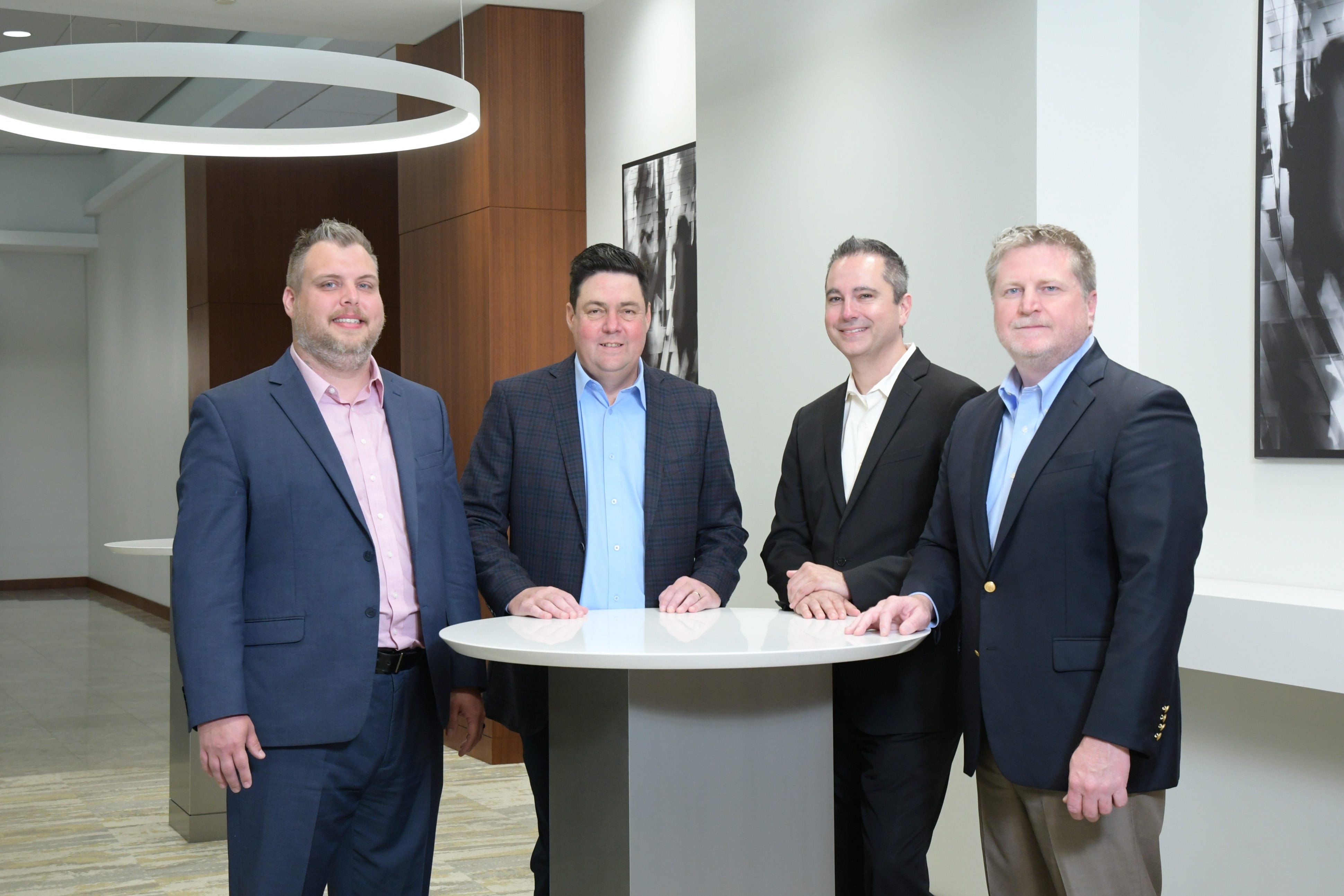 CTSI-Global's Managed Services Leadership Team, from left to right: Richard Perry, VP of global product management; Bryan Kelley, director of logistics operations; Josh Miller, VP of sales; Brian Scott, SVP of global sales.