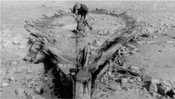 A 1958 photo shows the remains of a ship on a beach in York, Maine.